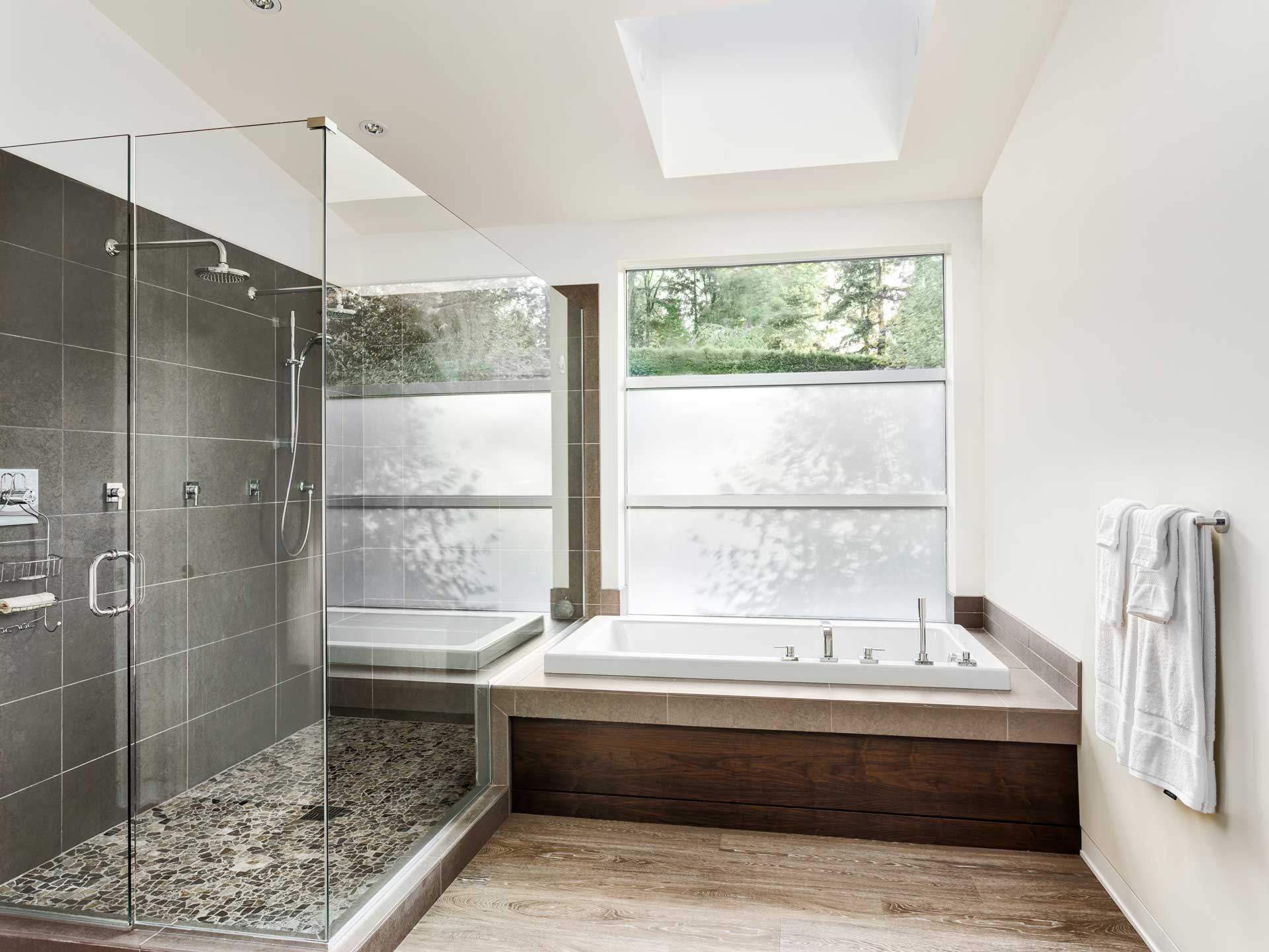 rustic modern bathroom renovation with stone and flooring